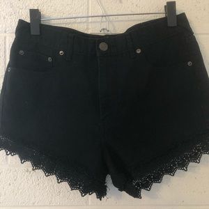 Free People black denim shorts